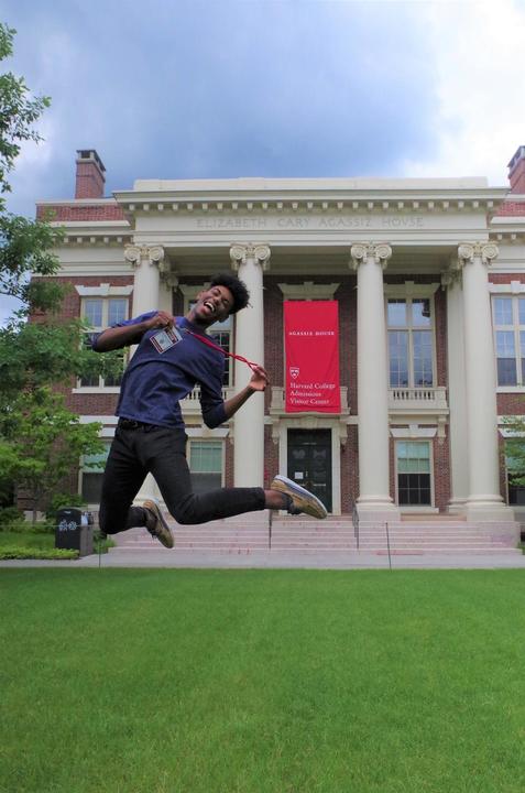 student jumping in the air